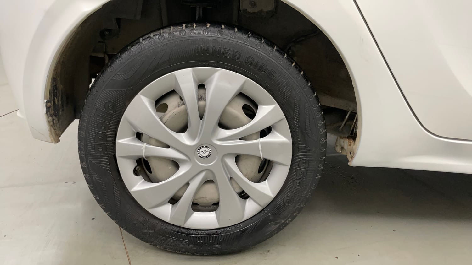 Used 2021 Tata Tiago XE Petrol Manual tyres RIGHT REAR TYRE RIM VIEW