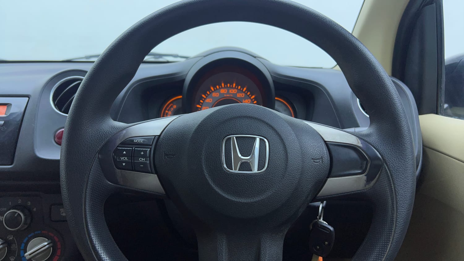 Used 2014 Honda Brio S MT Petrol Manual top_features Steering mounted controls