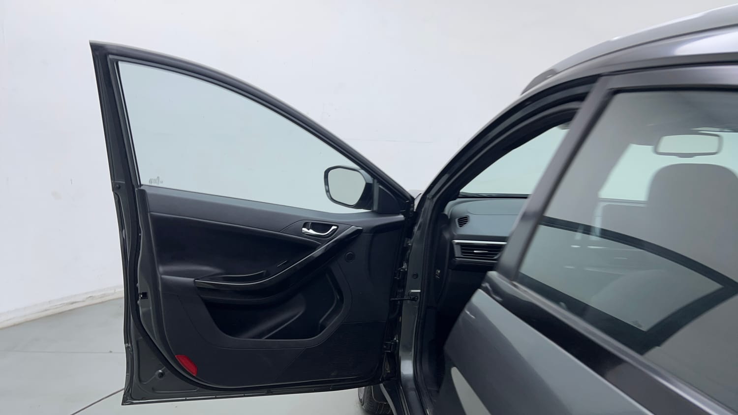 Used 2024 tata Nexon Fearless S 1.2 Revotron Petrol 7DCA Dual Tone Petrol Automatic interior LEFT FRONT DOOR OPEN VIEW