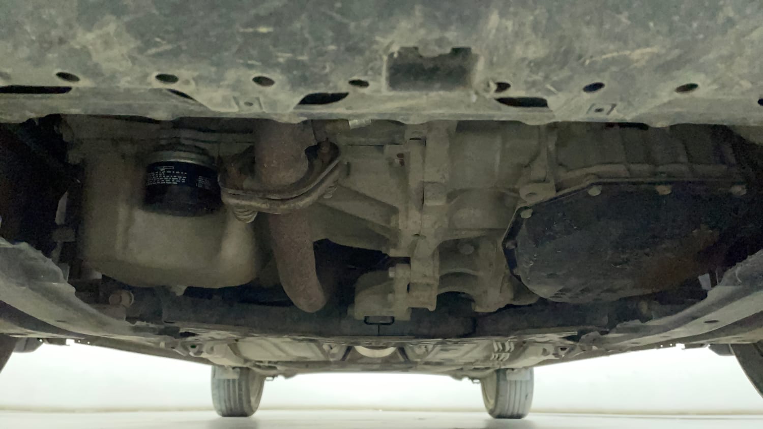 Used 2021 Maruti Suzuki Baleno Zeta Automatic Petrol Automatic extra FRONT LEFT UNDERBODY VIEW