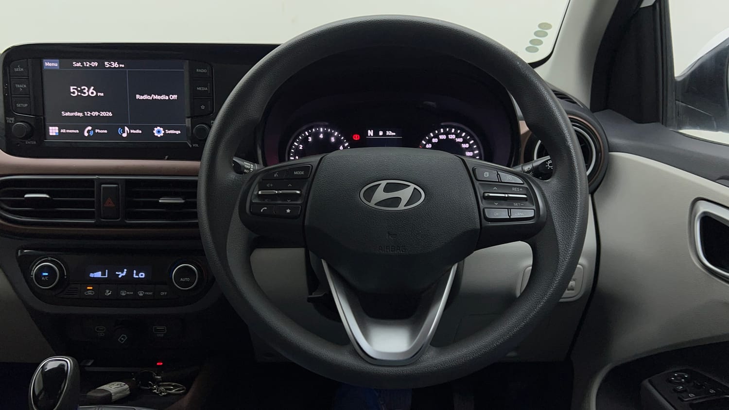 Used 2024 Hyundai Aura SX Plus 1.2 AMT Petrol Petrol Automatic interior STEERING VIEW