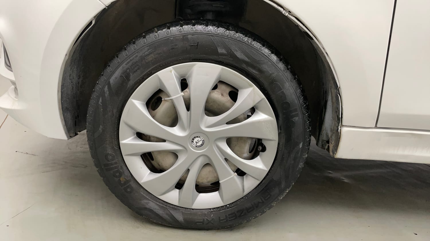 Used 2021 Tata Tiago XE Petrol Manual tyres LEFT FRONT TYRE RIM VIEW