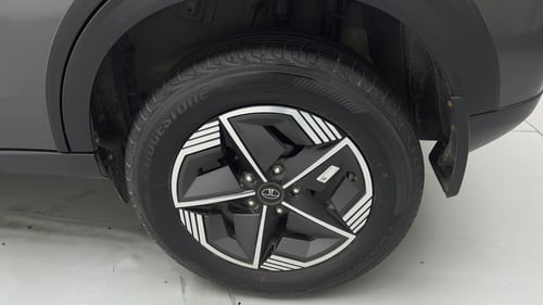 Used 2024 Tata Nexon Creative Plus 1.2 Revotron Petrol 7DCA Petrol Automatic tyres LEFT REAR TYRE RIM VIEW
