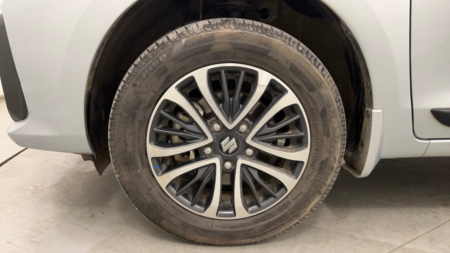 Used 2023 Maruti Suzuki Ertiga ZXi Plus Petrol Manual tyres LEFT FRONT TYRE RIM VIEW