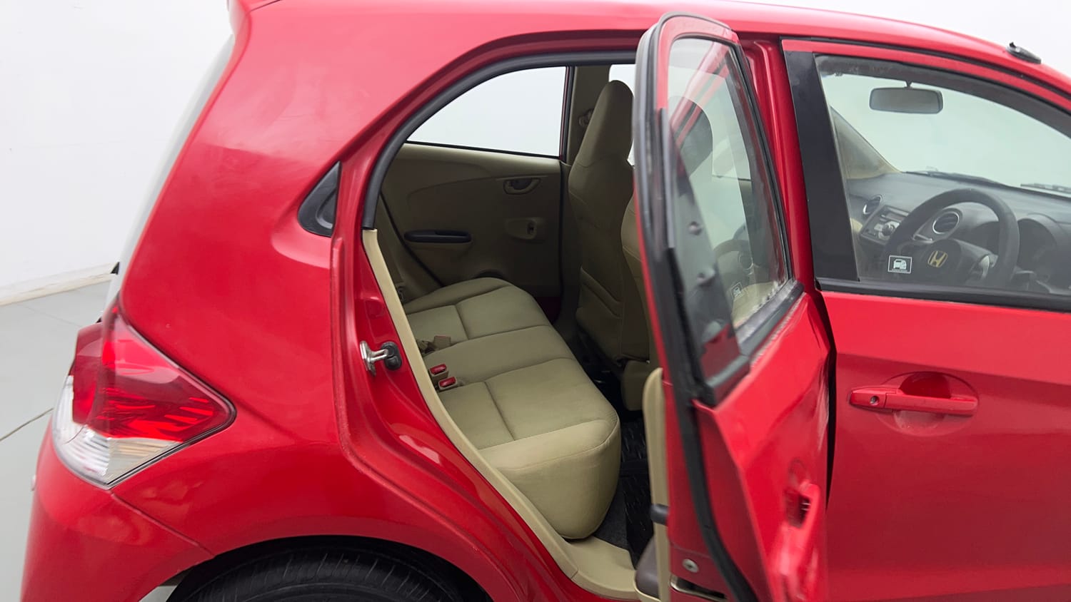 Used 2013 Honda Brio S MT Petrol Manual interior RIGHT SIDE REAR DOOR CABIN VIEW