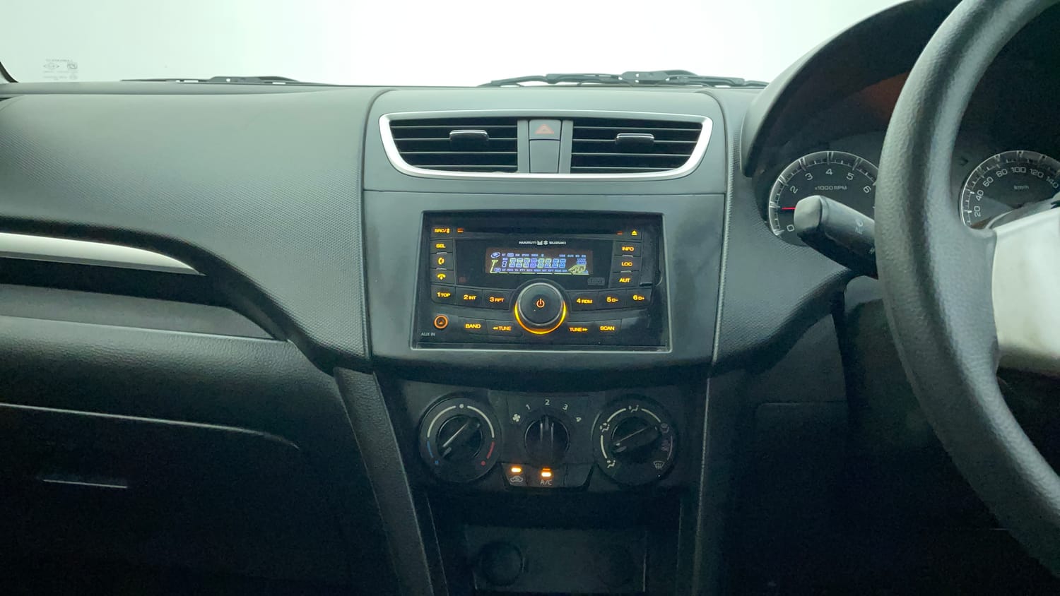 Used 2014 Maruti Suzuki Swift VXi Petrol Manual interior MUSIC SYSTEM & AC CONTROL VIEW