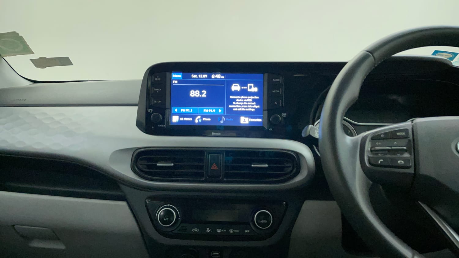 Used 2020 Hyundai Grand i10 Nios Asta 1.2 Kappa VTVT Petrol Manual interior MUSIC SYSTEM & AC CONTROL VIEW