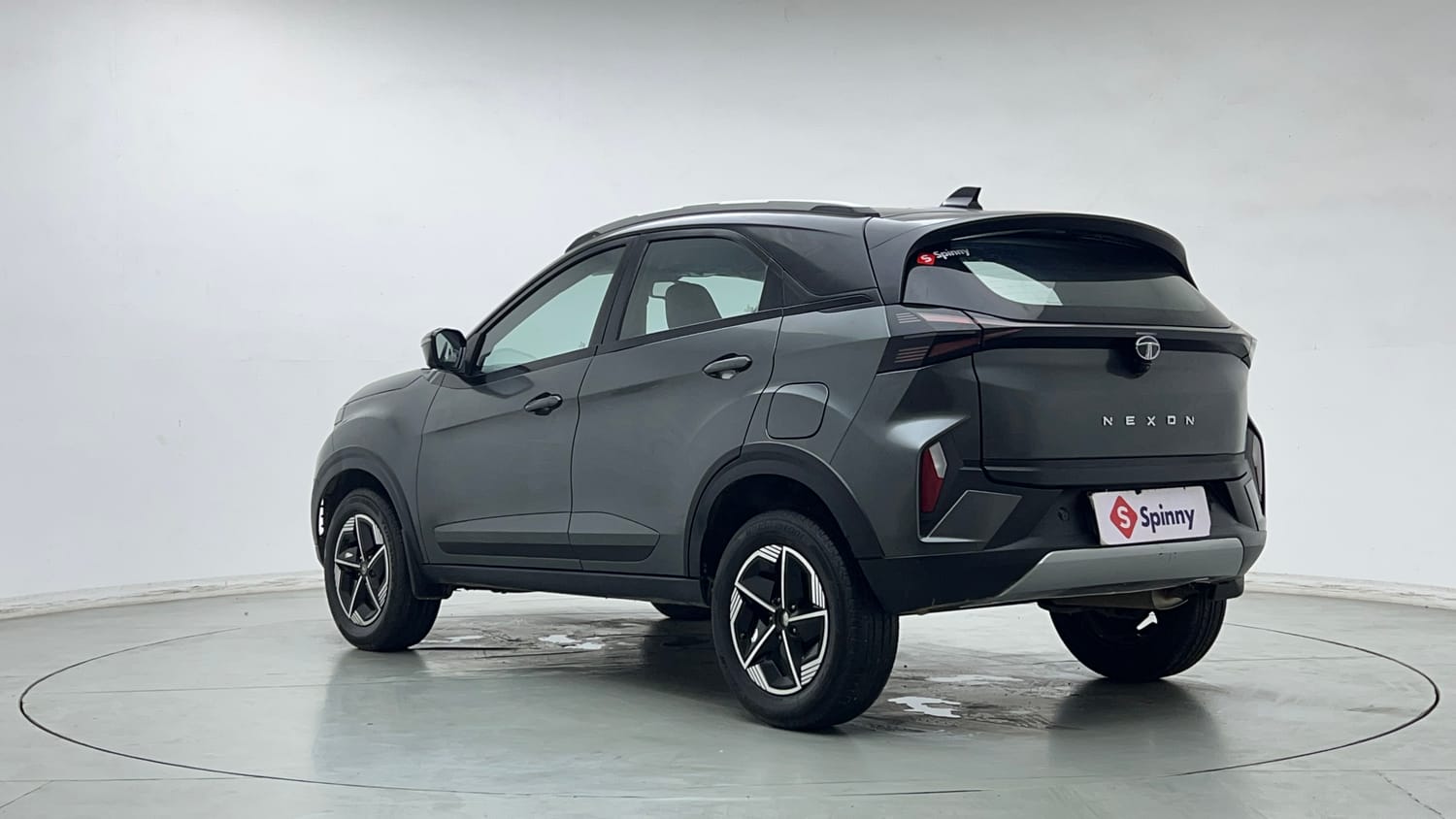 Used 2024 tata Nexon Fearless S 1.2 Revotron Petrol 7DCA Dual Tone Petrol Automatic exterior LEFT REAR CORNER VIEW