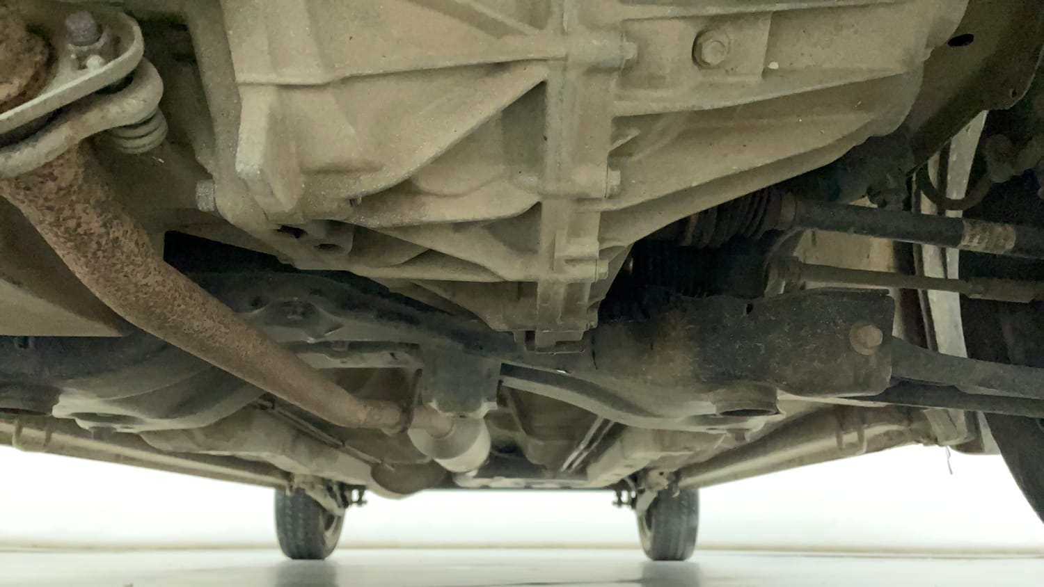 Used 2016 Maruti Suzuki Wagon R 1.0 VXI AMT Petrol Automatic extra FRONT LEFT UNDERBODY VIEW