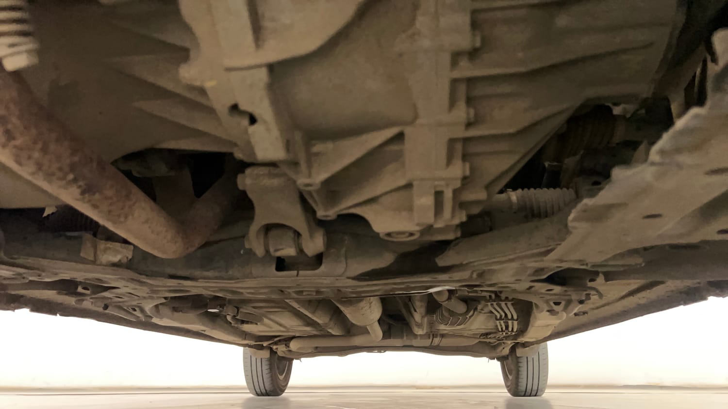 Used 2023 Maruti Suzuki Ertiga ZXi Plus Petrol Manual extra FRONT LEFT UNDERBODY VIEW