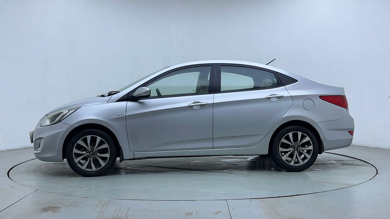 Used 2013 Hyundai Verna Fluidic 1.6 VTVT SX AT Petrol Automatic exterior LEFT SIDE VIEW