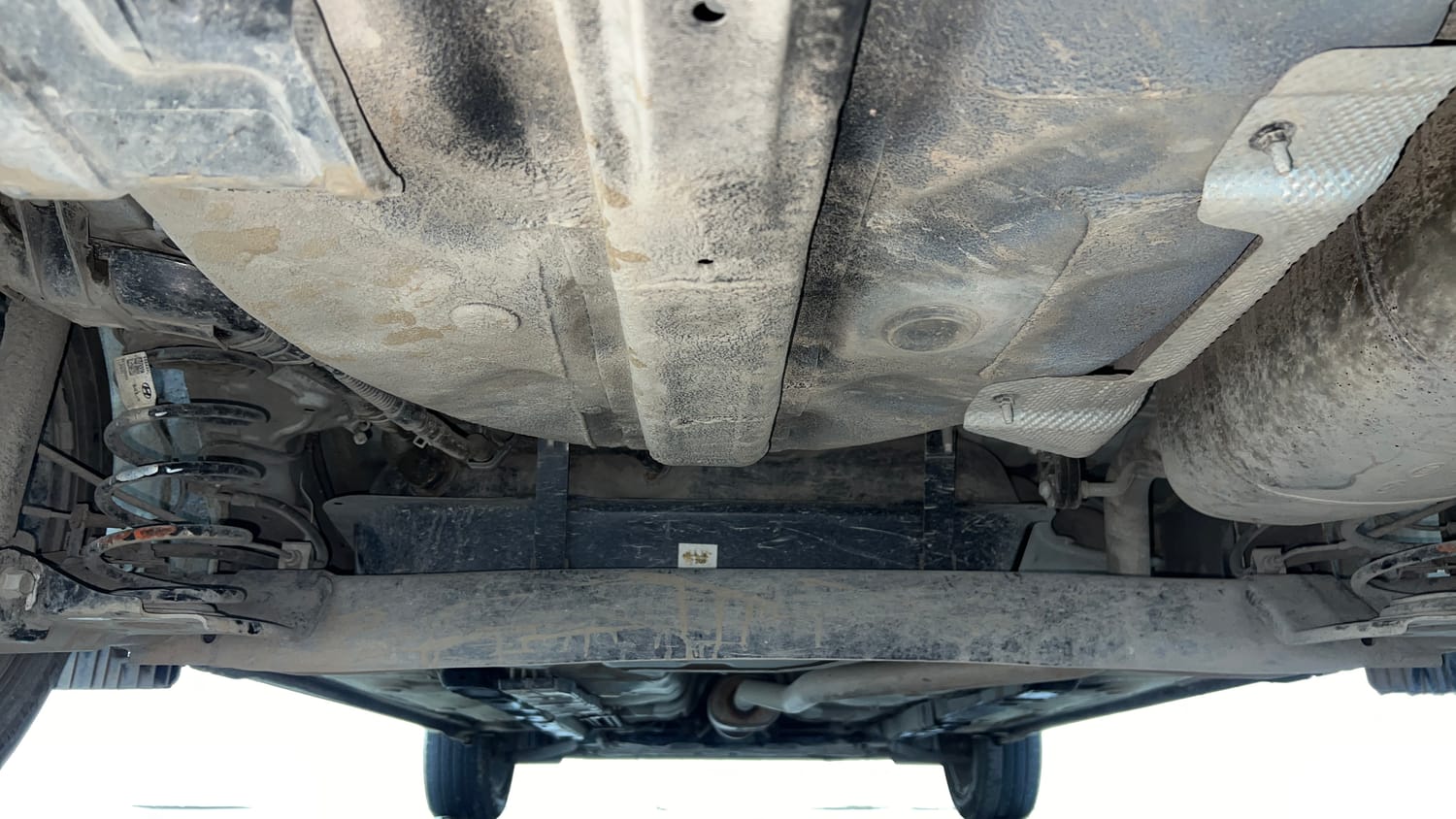 Used 2024 Hyundai Aura SX Plus 1.2 AMT Petrol Petrol Automatic extra REAR UNDERBODY VIEW (TAKEN FROM REAR)