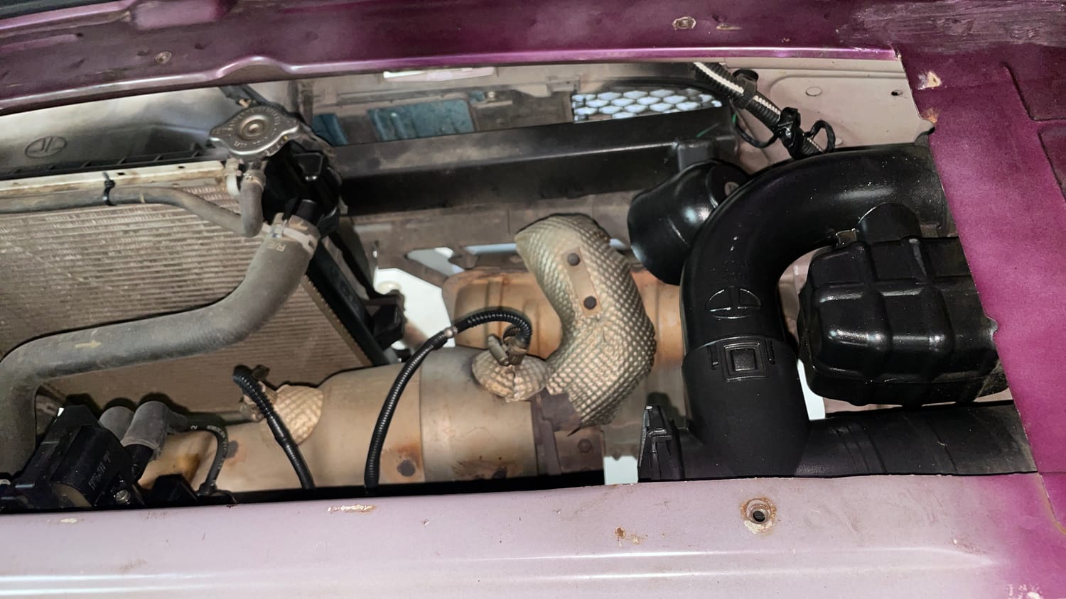 Used 2015 Tata Nano Twist XT Petrol Manual engine ENGINE LEFT SIDE VIEW