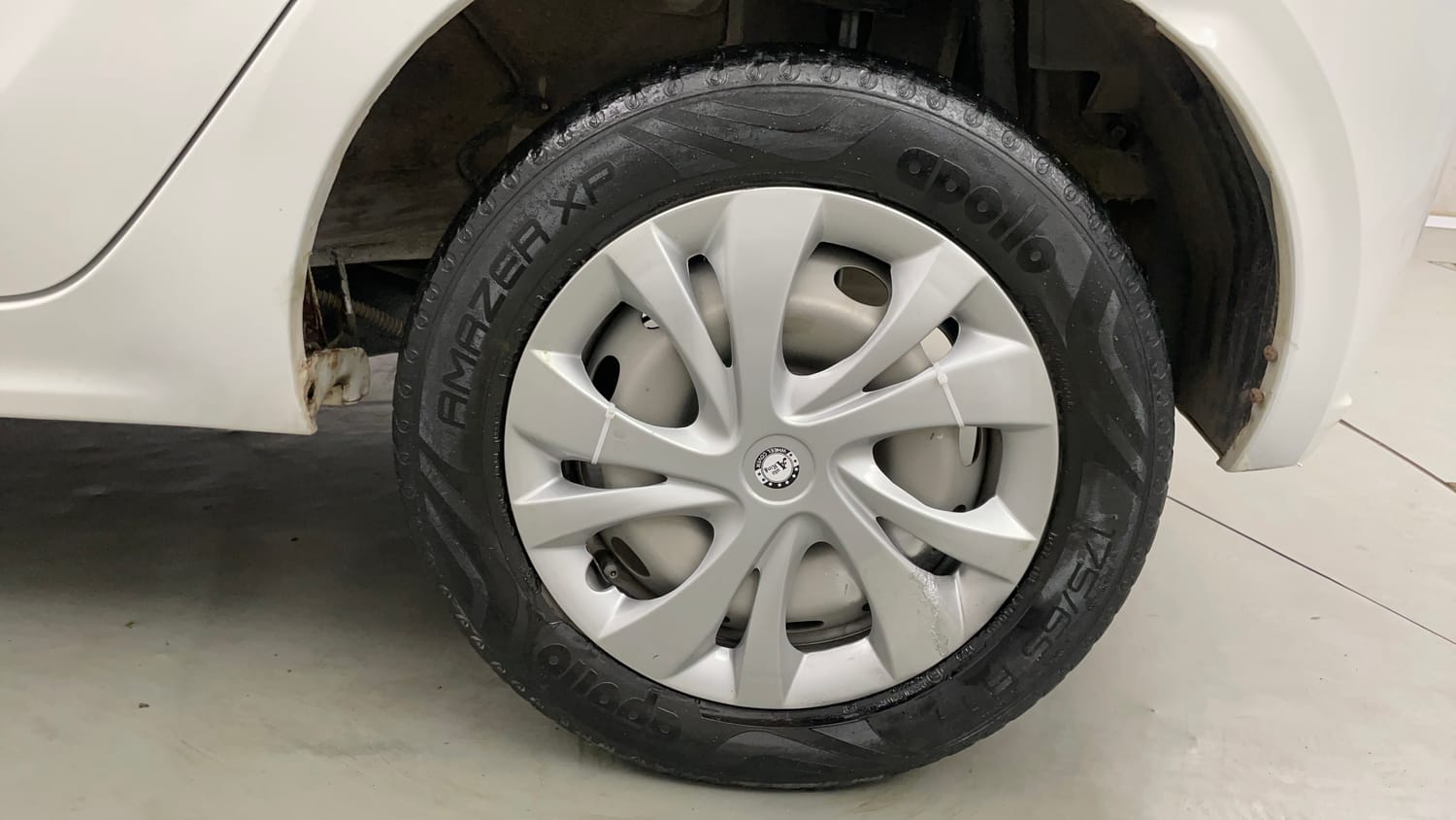 Used 2021 Tata Tiago XE Petrol Manual tyres LEFT REAR TYRE RIM VIEW