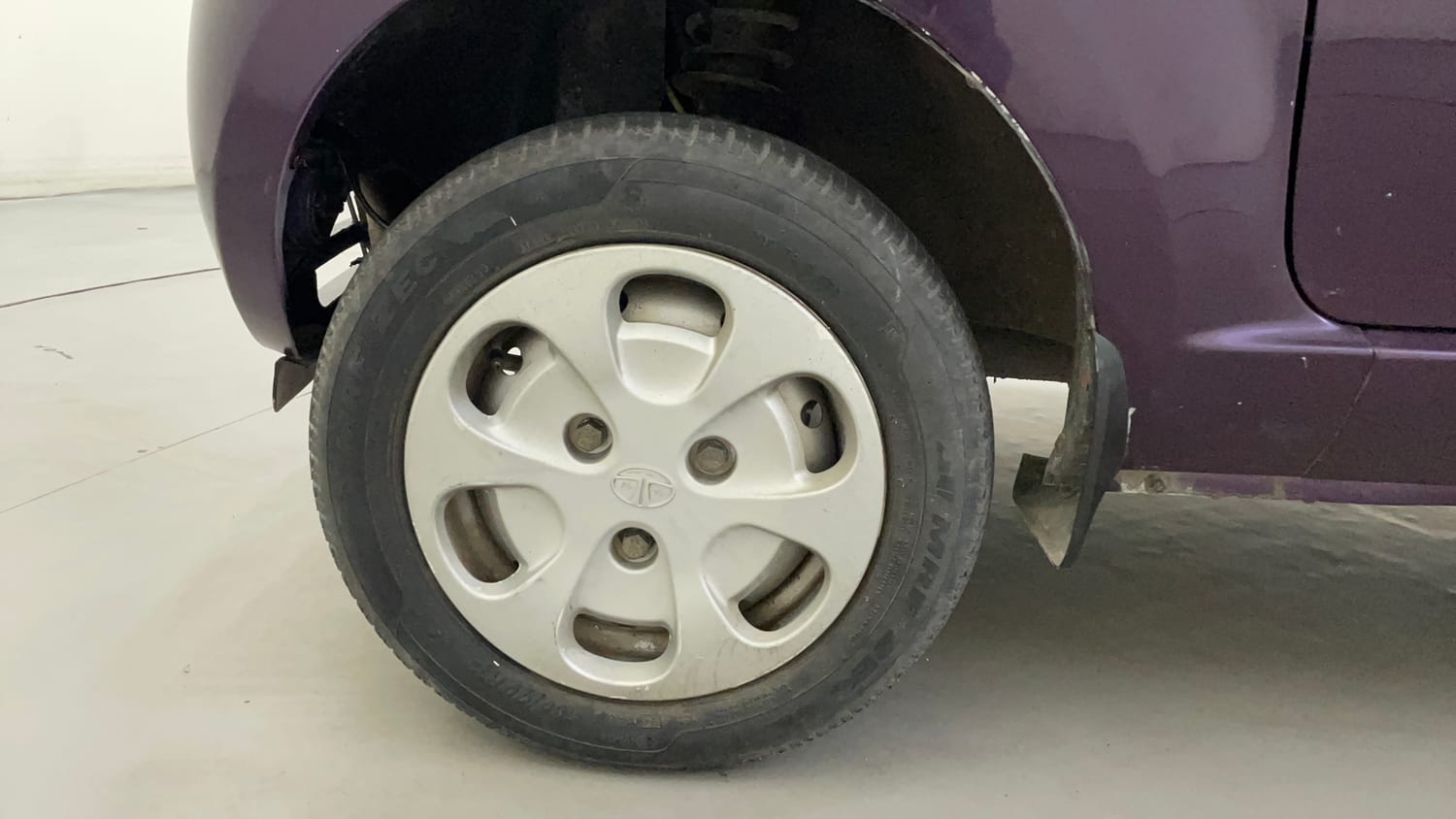 Used 2015 Tata Nano Twist XT Petrol Manual tyres LEFT FRONT TYRE RIM VIEW