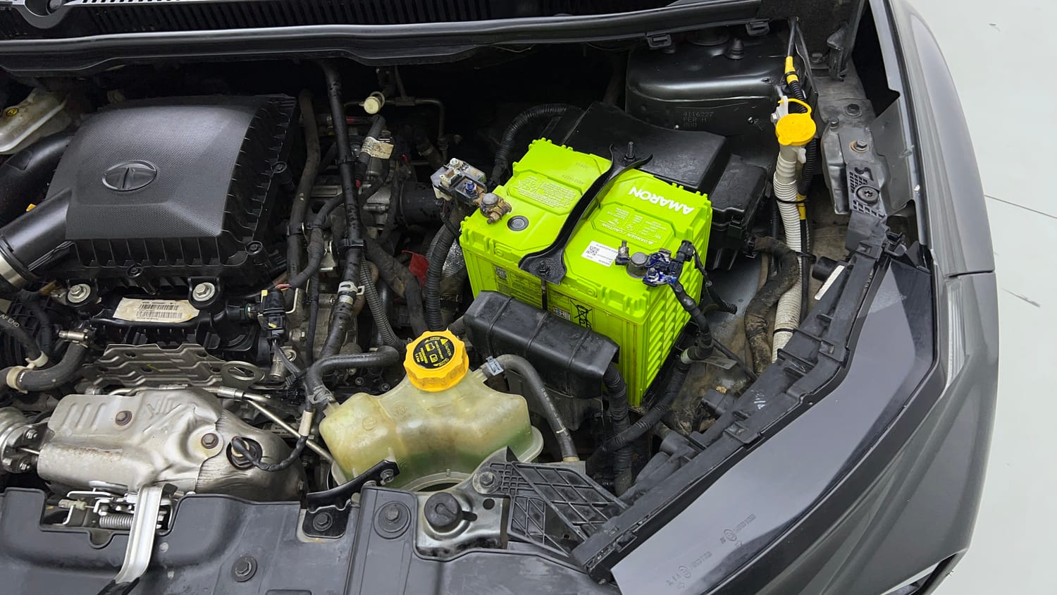 Used 2024 tata Nexon Fearless S 1.2 Revotron Petrol 7DCA Dual Tone Petrol Automatic engine ENGINE LEFT SIDE VIEW
