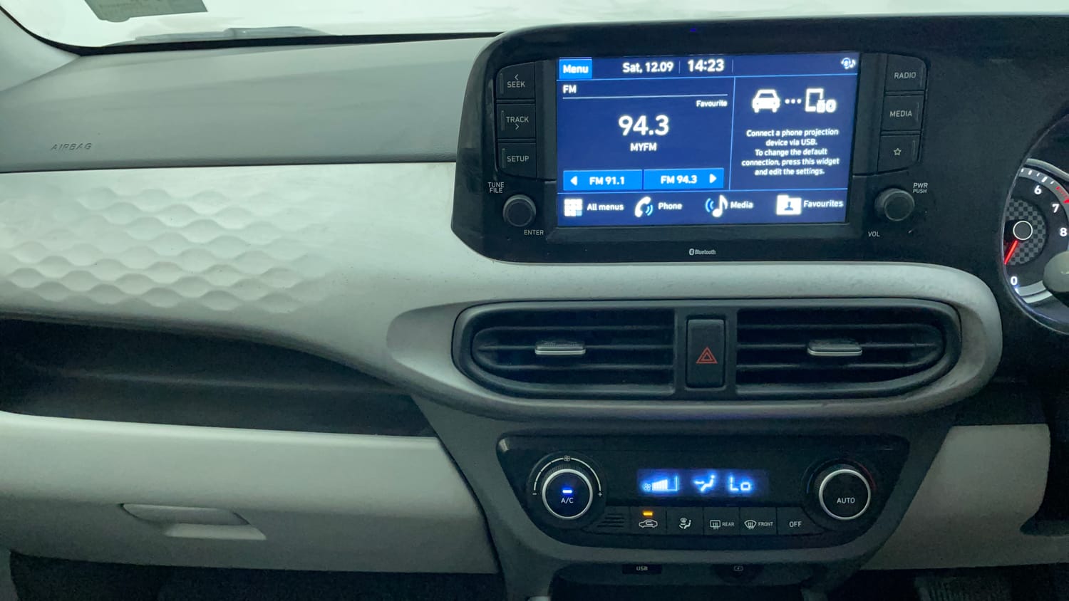 Used 2020 Hyundai Grand i10 Nios Sportz AMT 1.2 Kappa VTVT Petrol Automatic interior MUSIC SYSTEM & AC CONTROL VIEW