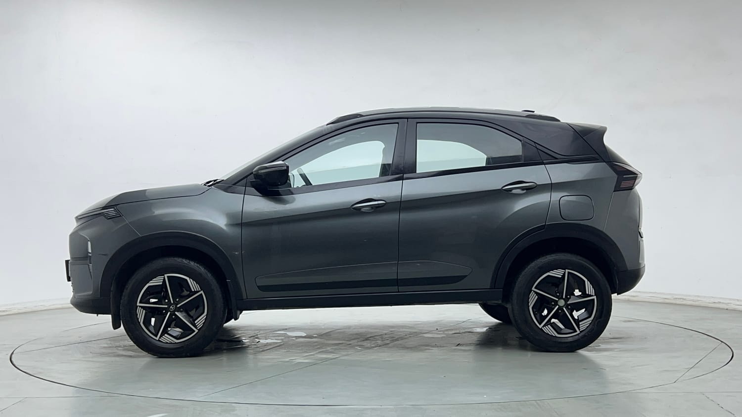 Used 2024 tata Nexon Fearless S 1.2 Revotron Petrol 7DCA Dual Tone Petrol Automatic exterior LEFT SIDE VIEW
