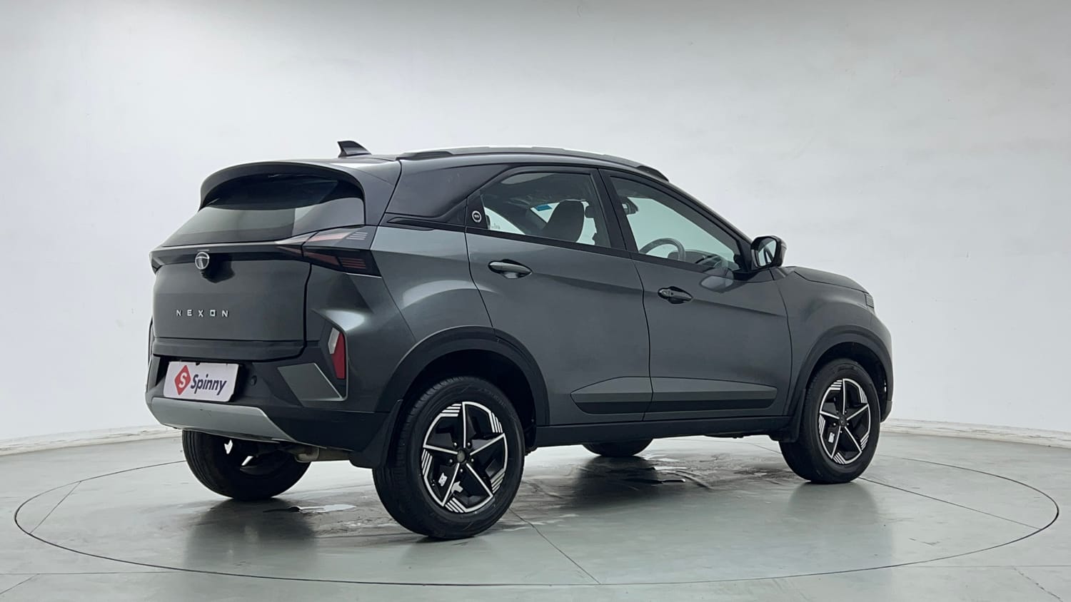 Used 2024 tata Nexon Fearless S 1.2 Revotron Petrol 7DCA Dual Tone Petrol Automatic exterior RIGHT REAR CORNER VIEW
