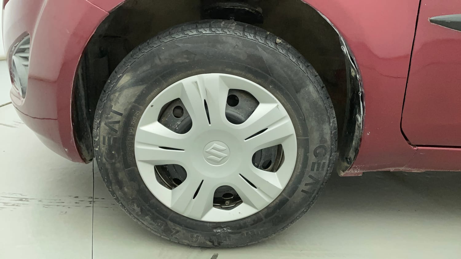 Used 2013 Maruti Suzuki Ritz Vxi BS-IV Petrol Manual tyres LEFT FRONT TYRE RIM VIEW