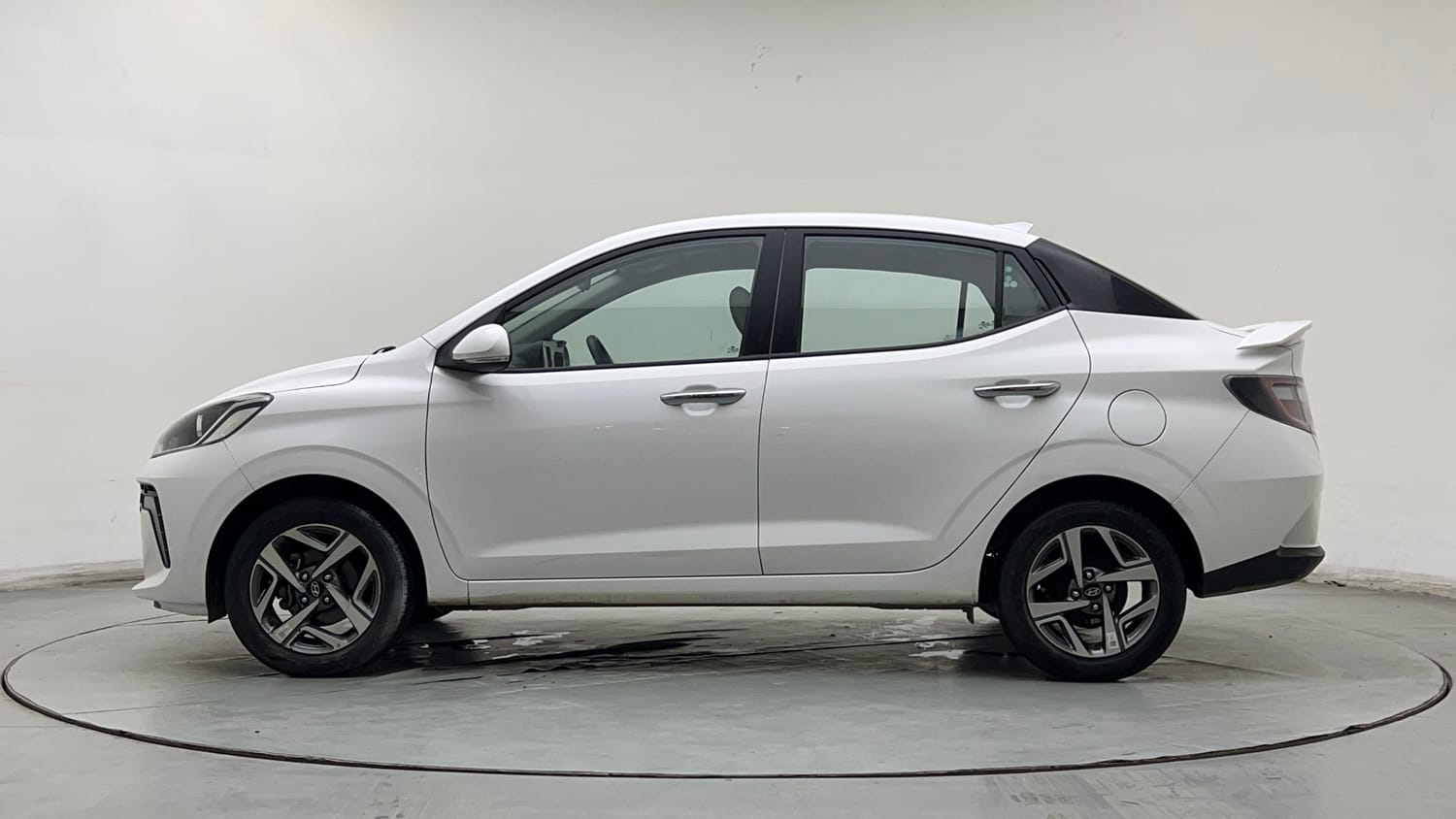 Used 2024 Hyundai Aura SX Plus 1.2 AMT Petrol Petrol Automatic exterior LEFT SIDE VIEW
