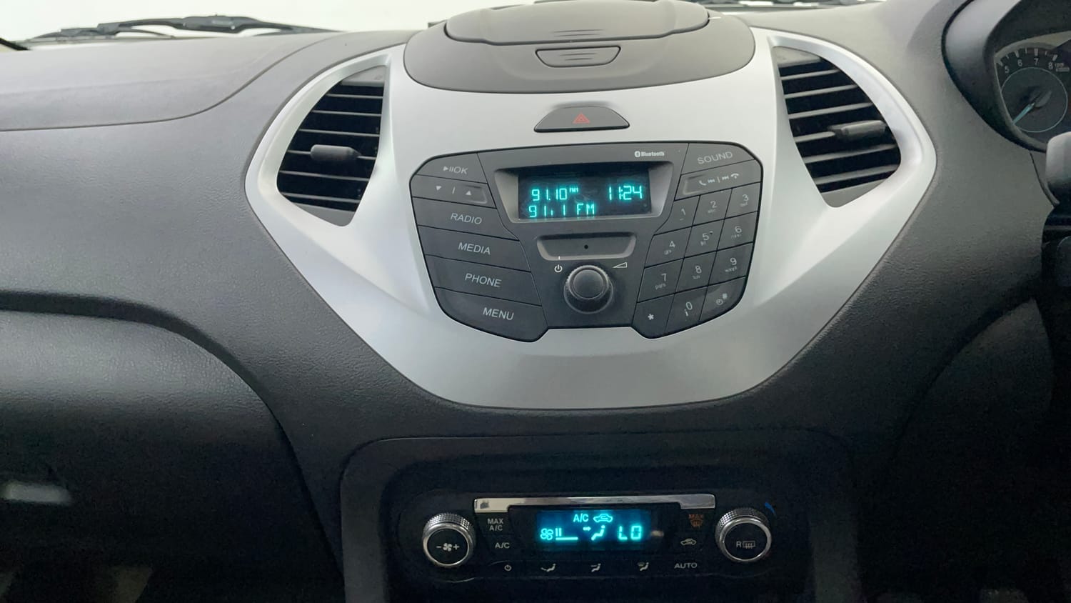 Used 2016 Ford Figo Titanium 1.2 Ti-VCT Petrol Manual interior MUSIC SYSTEM & AC CONTROL VIEW