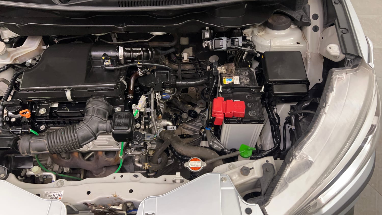 Used 2023 Maruti Suzuki Ertiga ZXi Plus Petrol Manual engine ENGINE LEFT SIDE VIEW