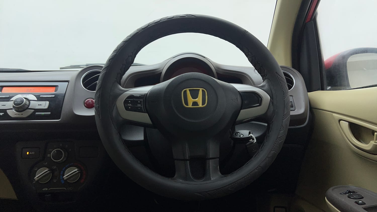 Used 2013 Honda Brio S MT Petrol Manual interior STEERING VIEW