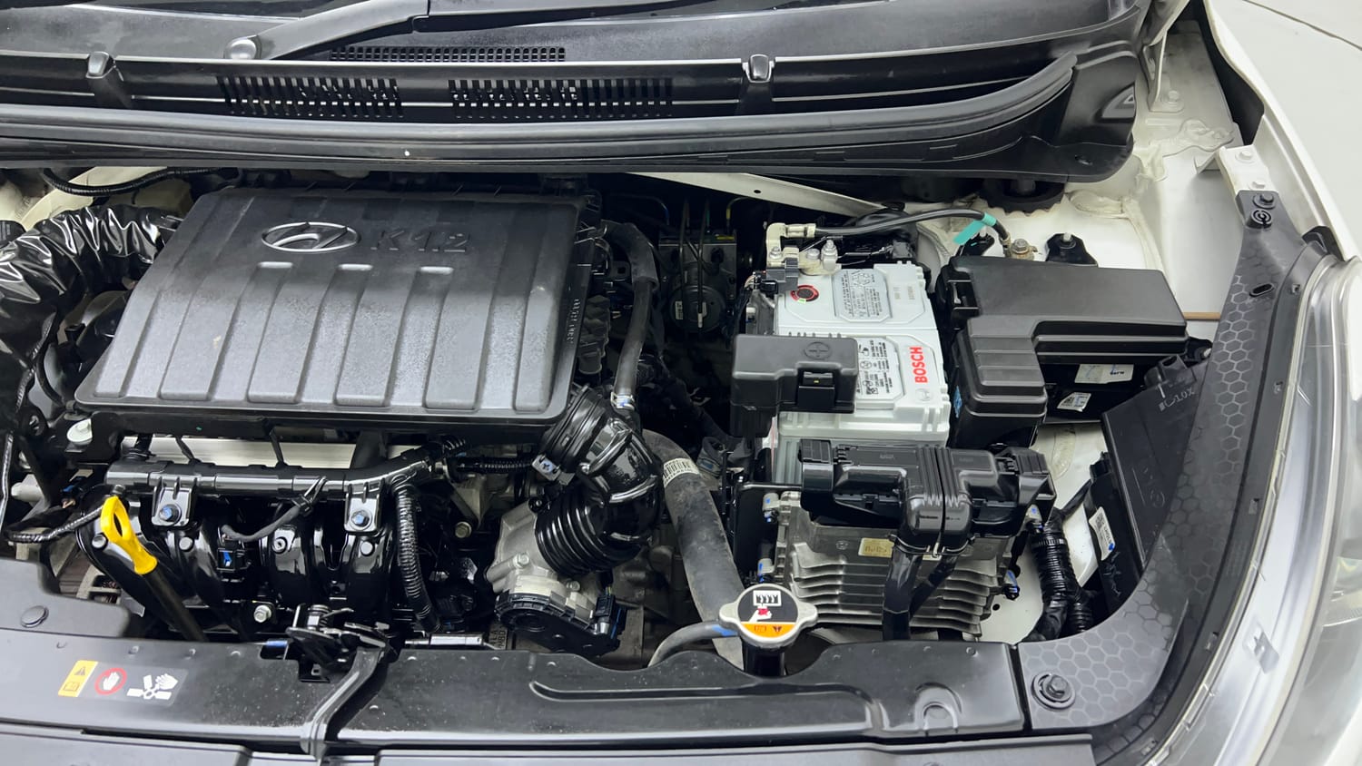Used 2024 Hyundai Aura SX Plus 1.2 AMT Petrol Petrol Automatic engine ENGINE LEFT SIDE VIEW
