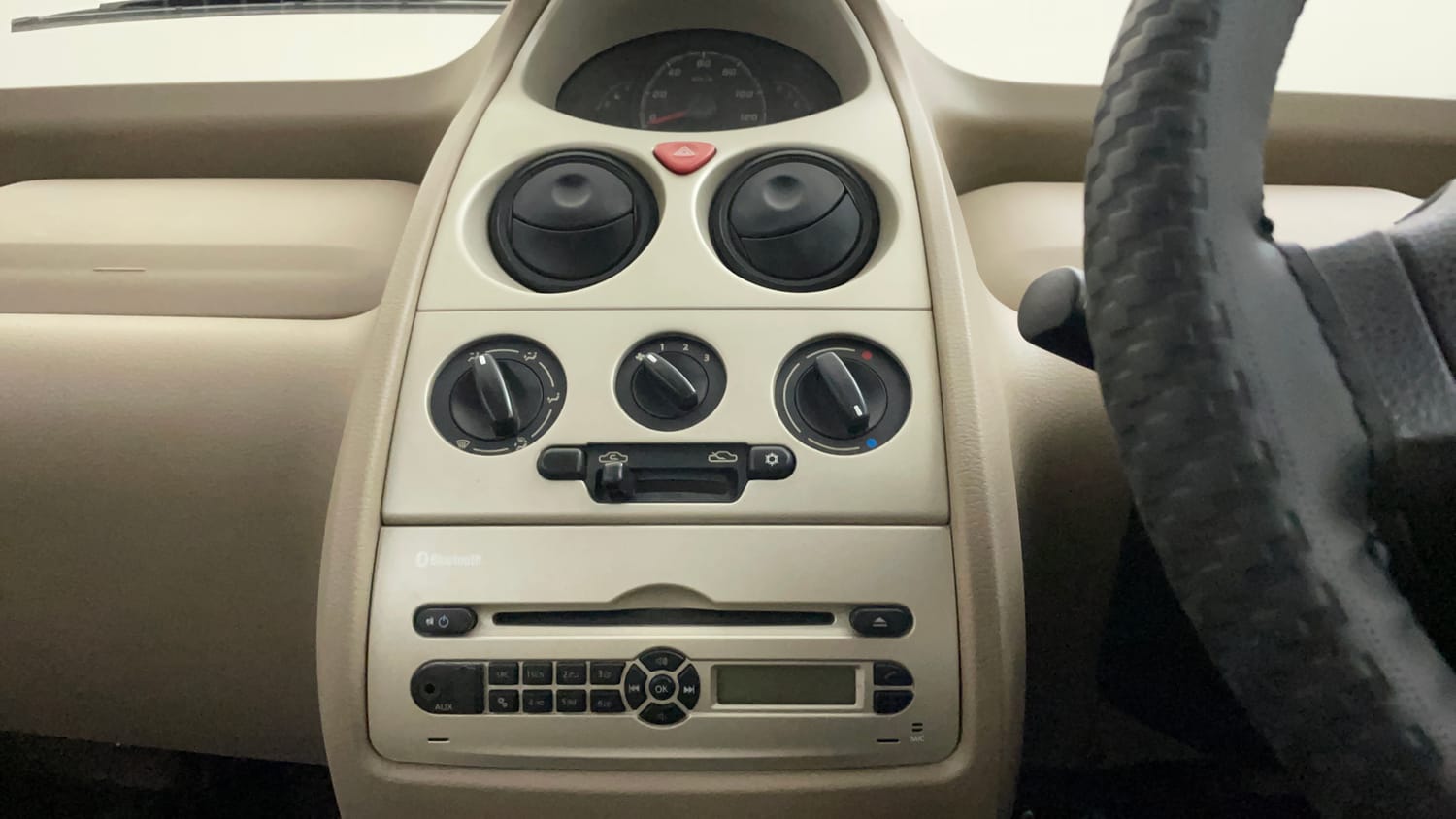 Used 2015 Tata Nano Twist XT Petrol Manual top_features Integrated (in-dash) music system