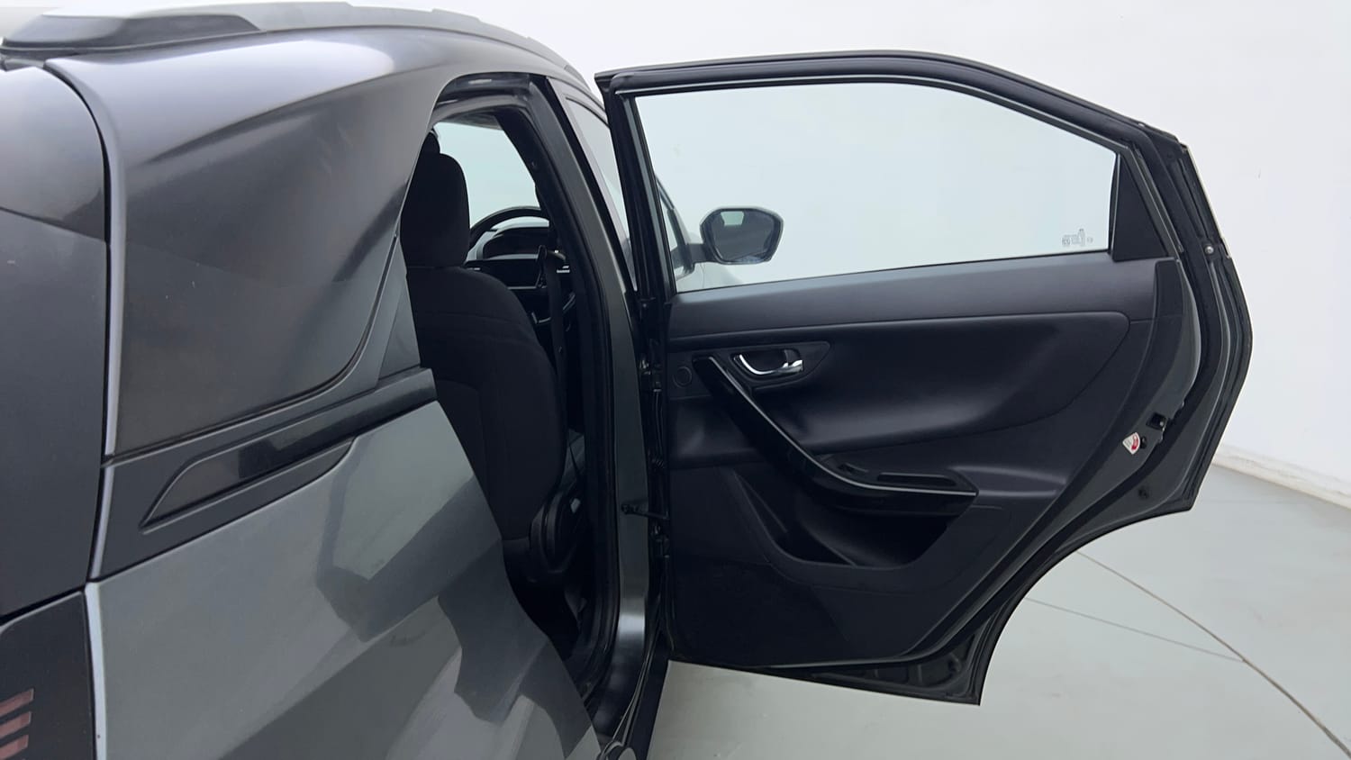 Used 2024 tata Nexon Fearless S 1.2 Revotron Petrol 7DCA Dual Tone Petrol Automatic interior RIGHT REAR DOOR OPEN VIEW