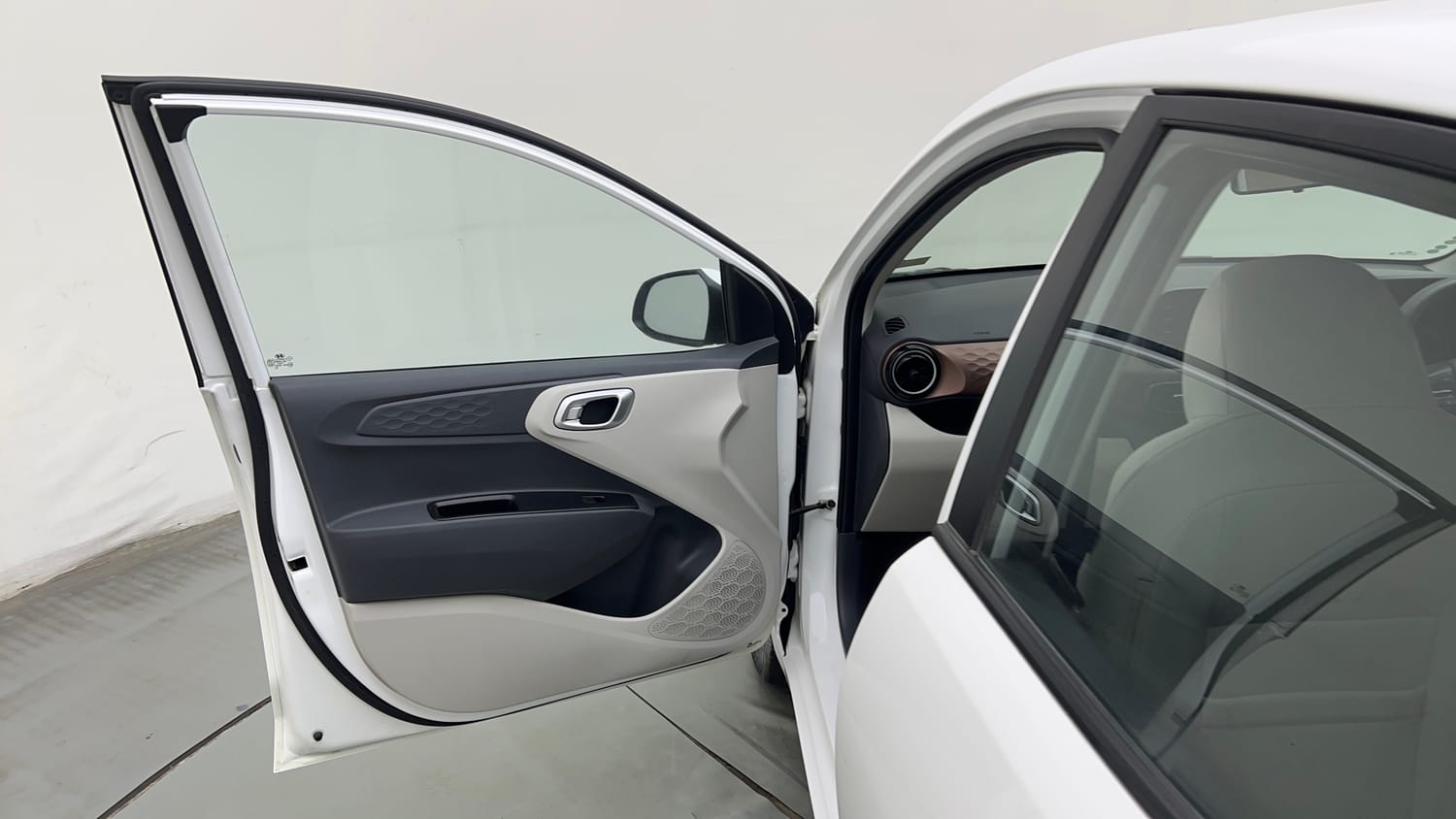 Used 2024 Hyundai Aura SX Plus 1.2 AMT Petrol Petrol Automatic interior LEFT FRONT DOOR OPEN VIEW