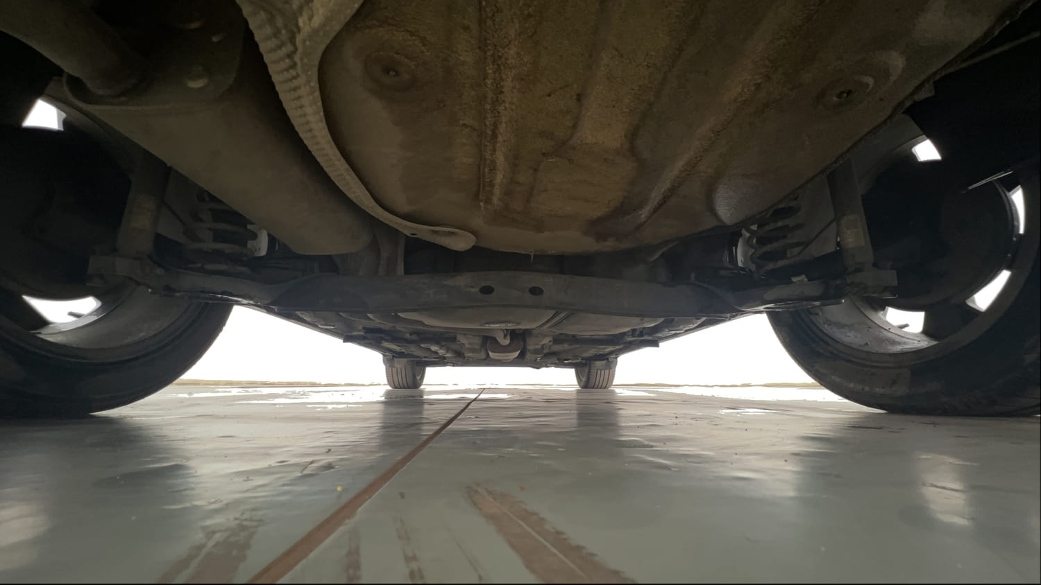 Used 2022 Volkswagen Taigun Topline 1.0 TSI MT Petrol Manual extra REAR UNDERBODY VIEW (TAKEN FROM REAR)