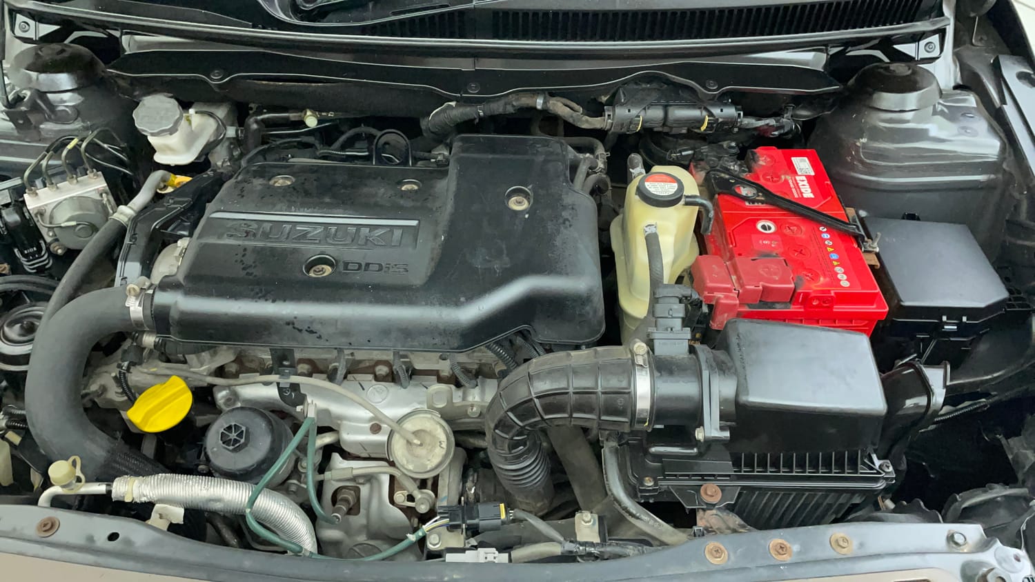 Used 2017 Maruti Suzuki Ciaz Alpha 1.3 Hybrid Diesel Manual engine ENGINE LEFT SIDE VIEW
