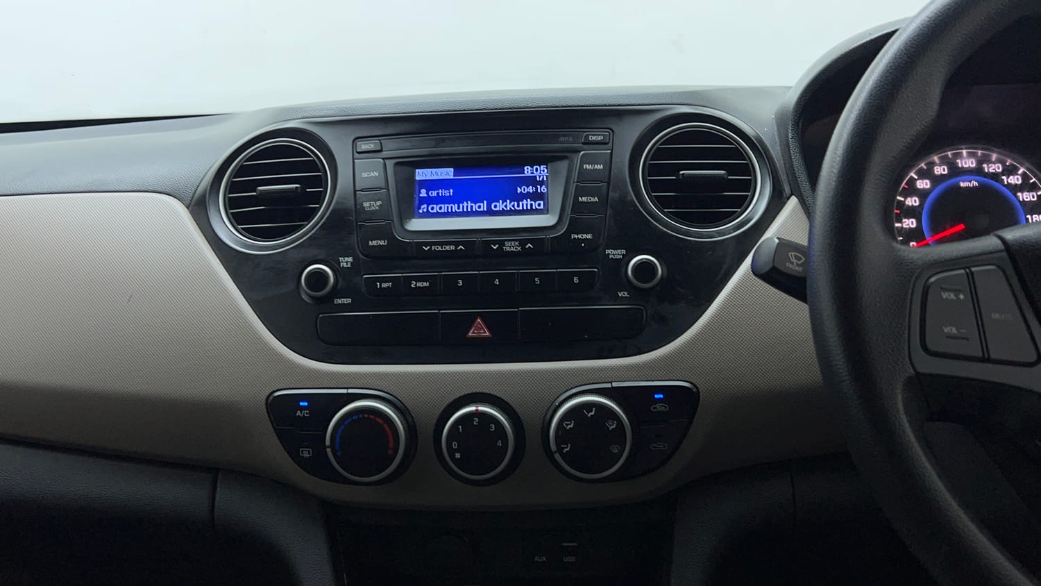 Used 2016 Hyundai Grand i10 Sportz 1.2 Kappa VTVT Petrol Manual interior MUSIC SYSTEM & AC CONTROL VIEW