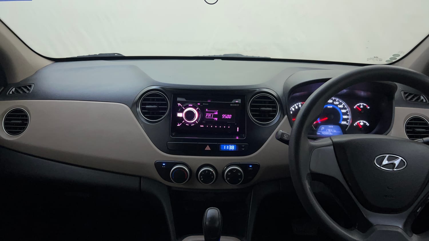 Used 2017 Hyundai Grand i10 Magna AT 1.2 Kappa VTVT Petrol Automatic interior MUSIC SYSTEM & AC CONTROL VIEW
