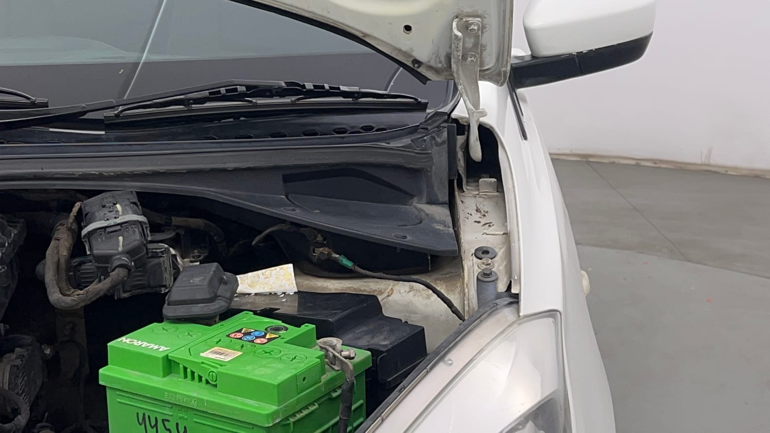 Used 2019 Tata Tiago Revotron XT Petrol Manual engine ENGINE LEFT SIDE HINGE & APRON VIEW