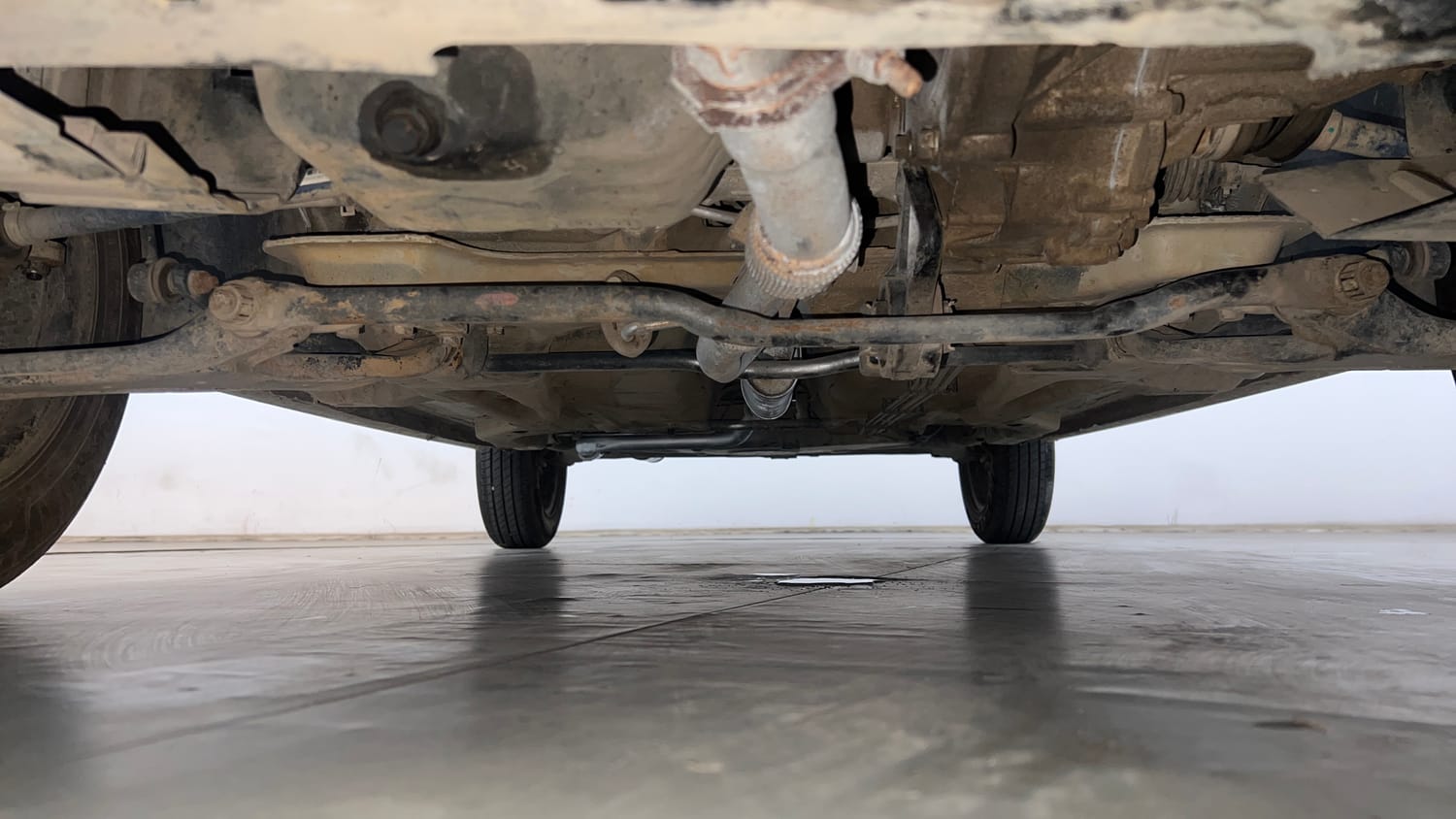 Used 2019 Tata Tiago Revotron XT Petrol Manual extra FRONT LEFT UNDERBODY VIEW