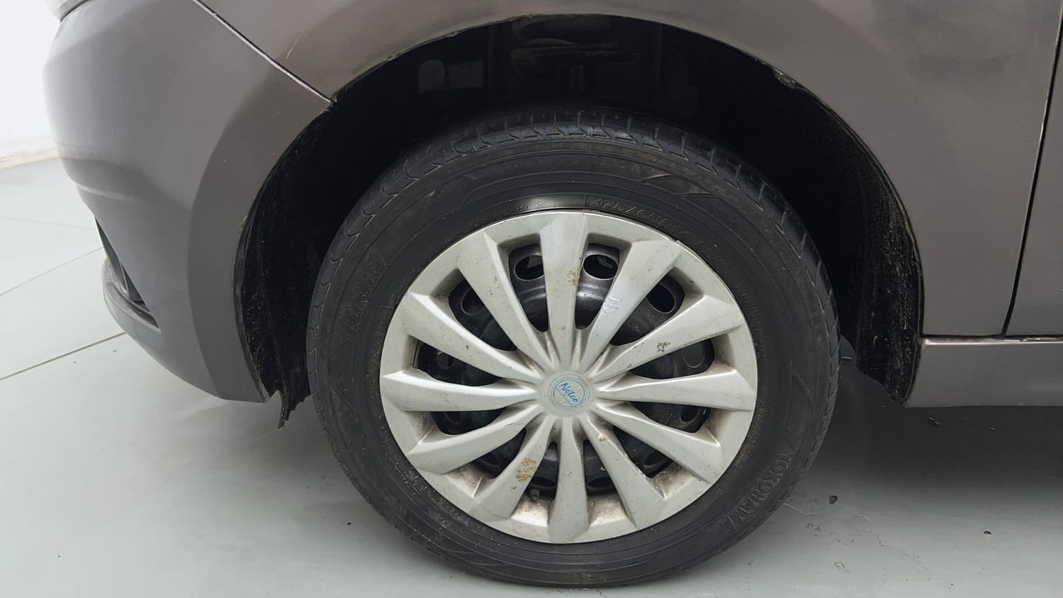 Used 2017 Tata Tiago Revotron XT Petrol Manual tyres LEFT FRONT TYRE RIM VIEW