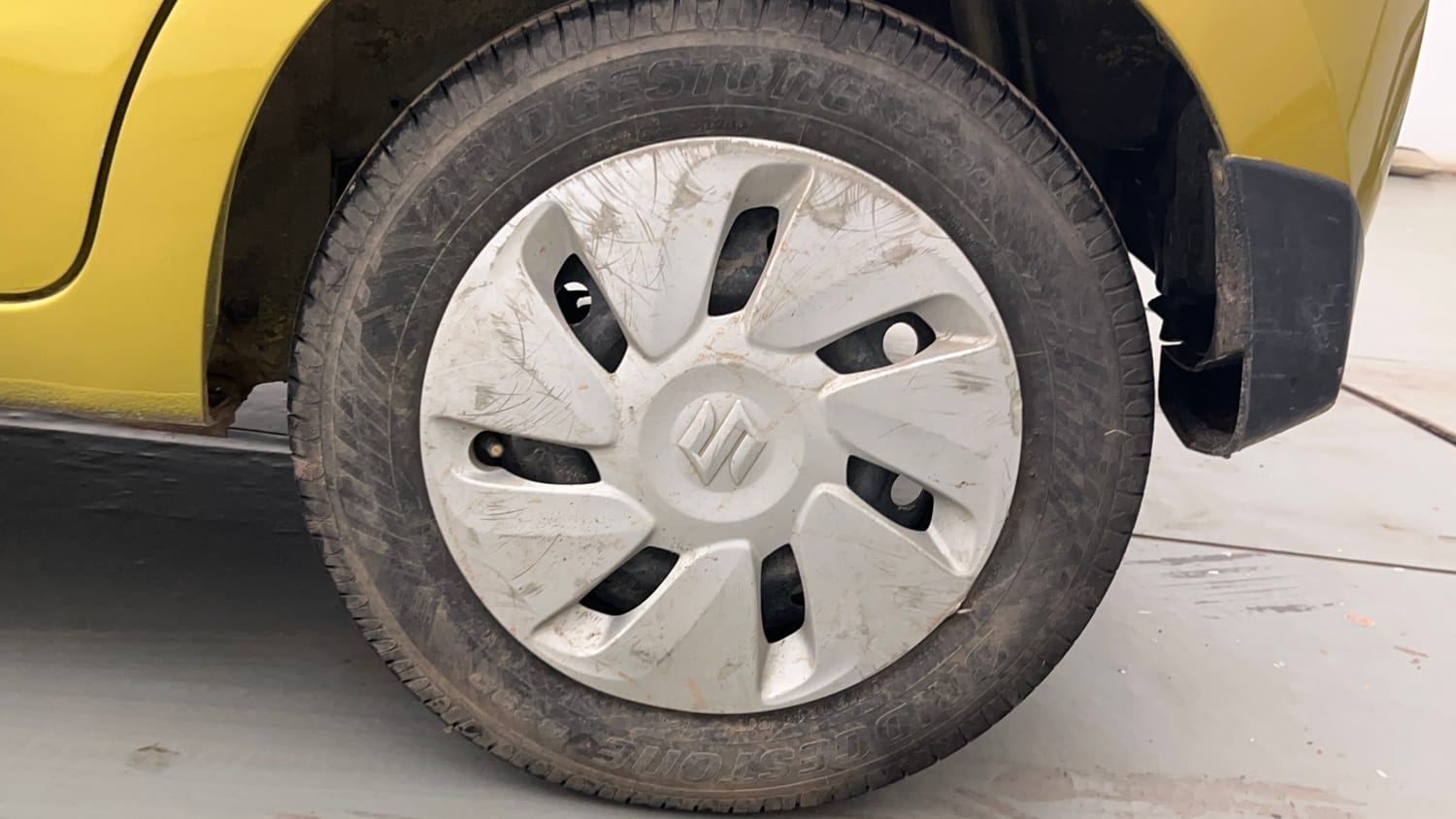 Used 2014 Maruti Suzuki Celerio VXi Petrol Manual tyres LEFT REAR TYRE RIM VIEW