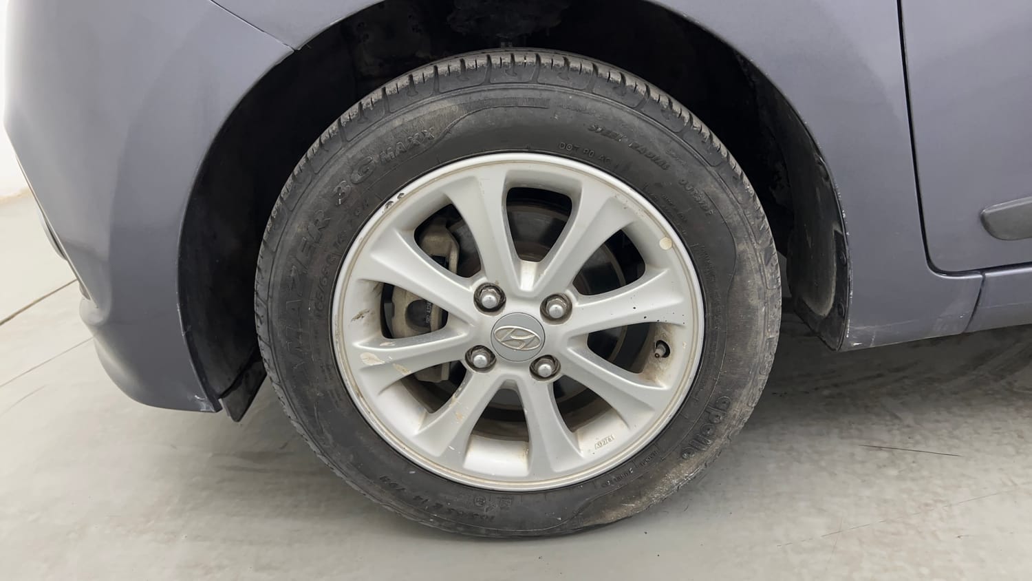 Used 2014 Hyundai Grand i10 Asta AT 1.2 Kappa VTVT Petrol Automatic tyres LEFT FRONT TYRE RIM VIEW
