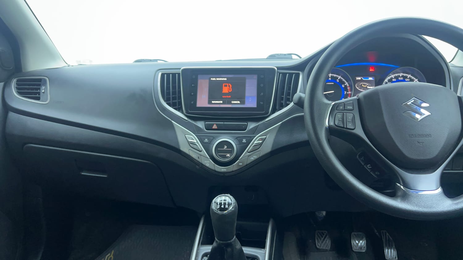 Used 2019 Maruti Suzuki Baleno Zeta 1.2 Petrol Manual top_features Integrated (in-dash) music system
