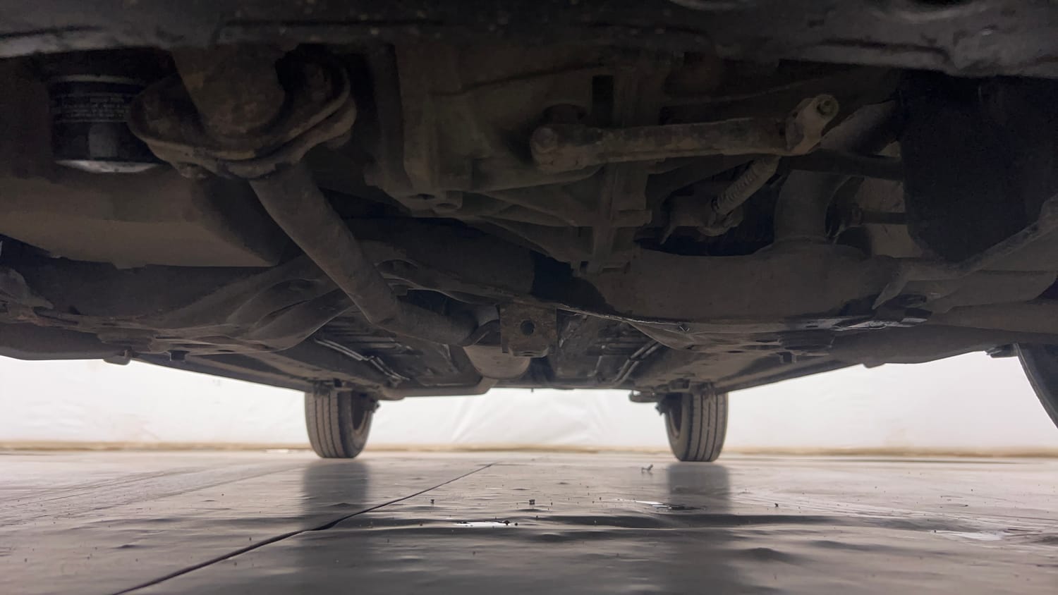 Used 2014 Maruti Suzuki Celerio VXi Petrol Manual extra FRONT LEFT UNDERBODY VIEW