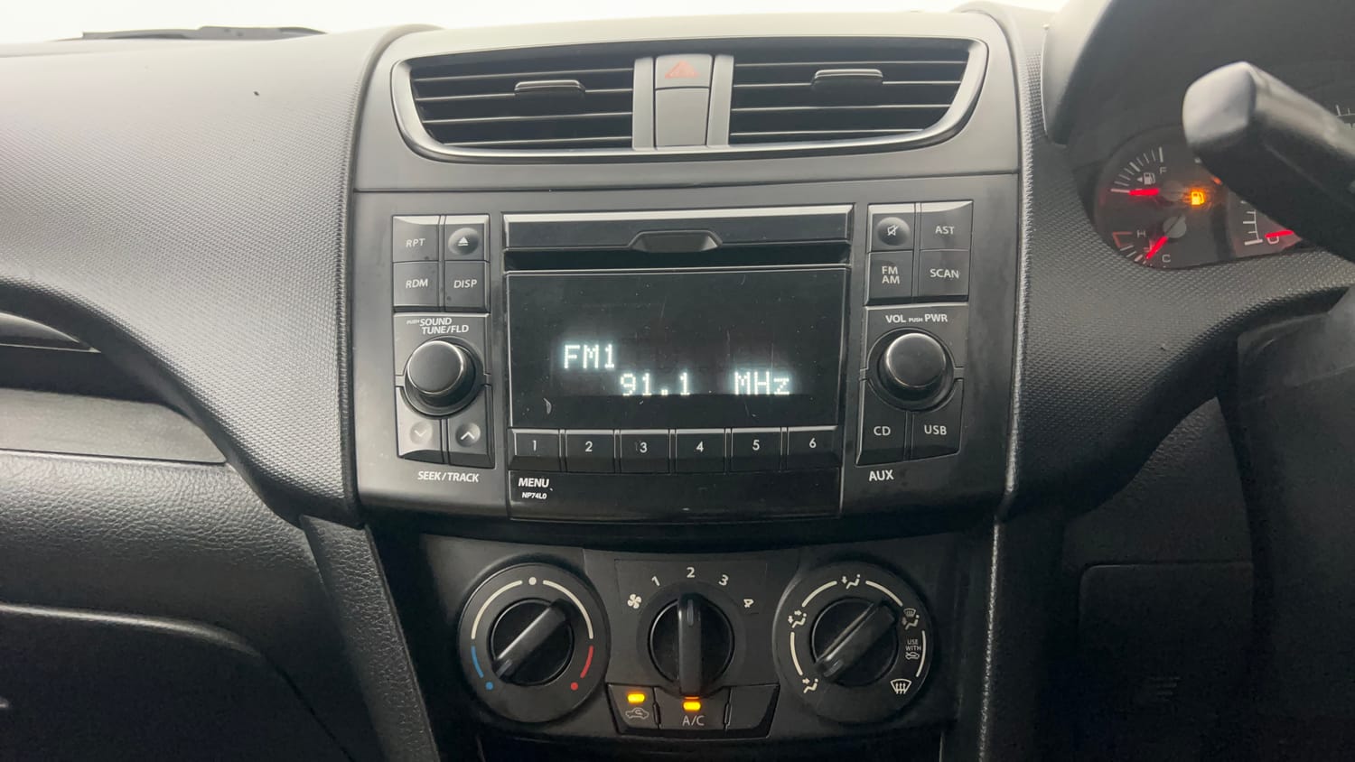Used 2012 Maruti Suzuki Swift LXi Petrol Manual interior MUSIC SYSTEM & AC CONTROL VIEW