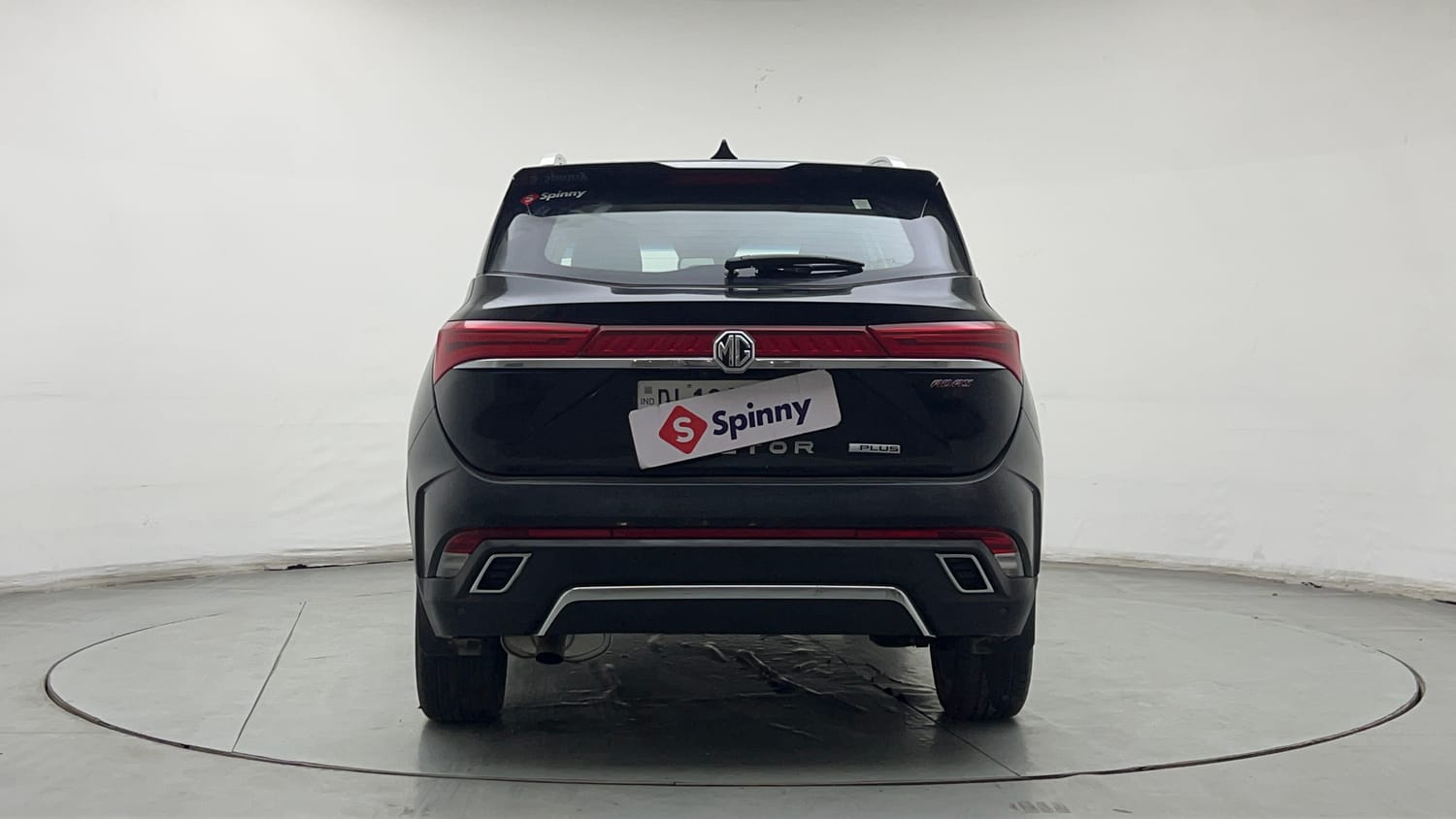 Used 2023 MG Motors Hector Plus Savvy Pro 1.5 Turbo Petrol CVT 6 STR Petrol Automatic exterior BACK VIEW