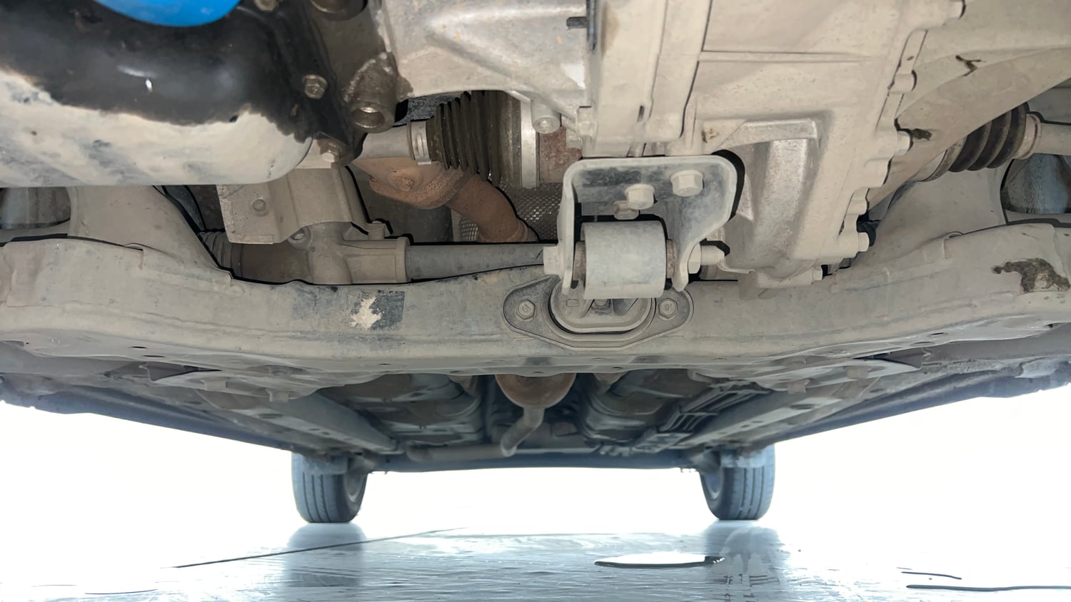 Used 2022 Hyundai Aura SX 1.2 Petrol Petrol Manual extra FRONT LEFT UNDERBODY VIEW