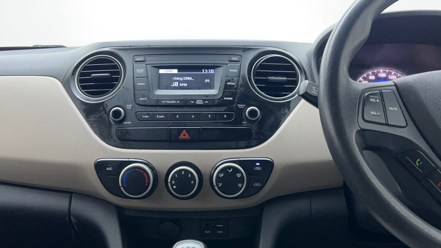 Used 2018 Hyundai Grand i10 Magna 1.2 Kappa VTVT Petrol Manual interior MUSIC SYSTEM & AC CONTROL VIEW