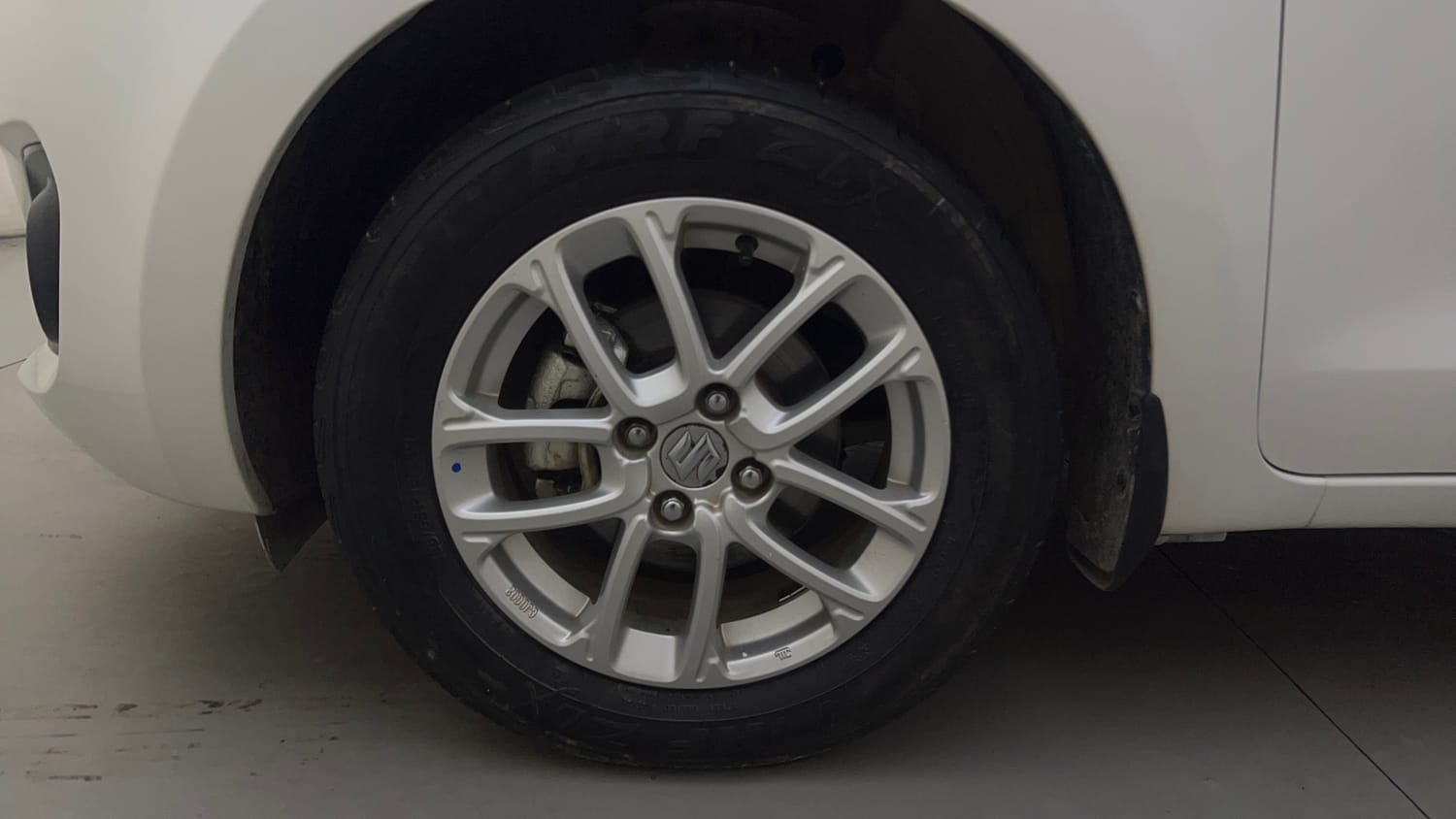 Used 2022 Maruti Suzuki Swift ZXi AMT Petrol Automatic tyres LEFT FRONT TYRE RIM VIEW