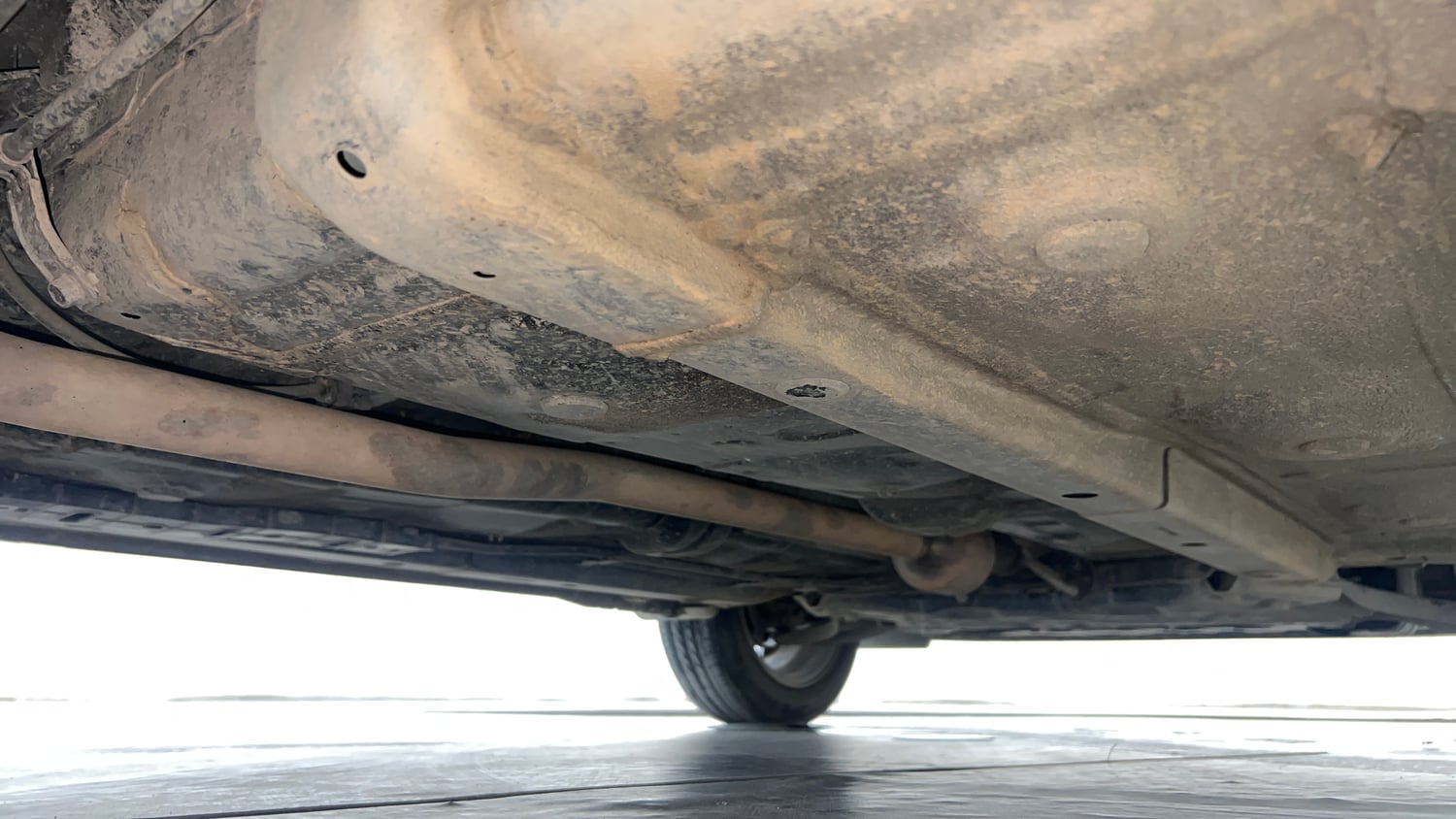 Used 2022 Hyundai Aura SX 1.2 Petrol Petrol Manual extra REAR RIGHT UNDERBODY VIEW