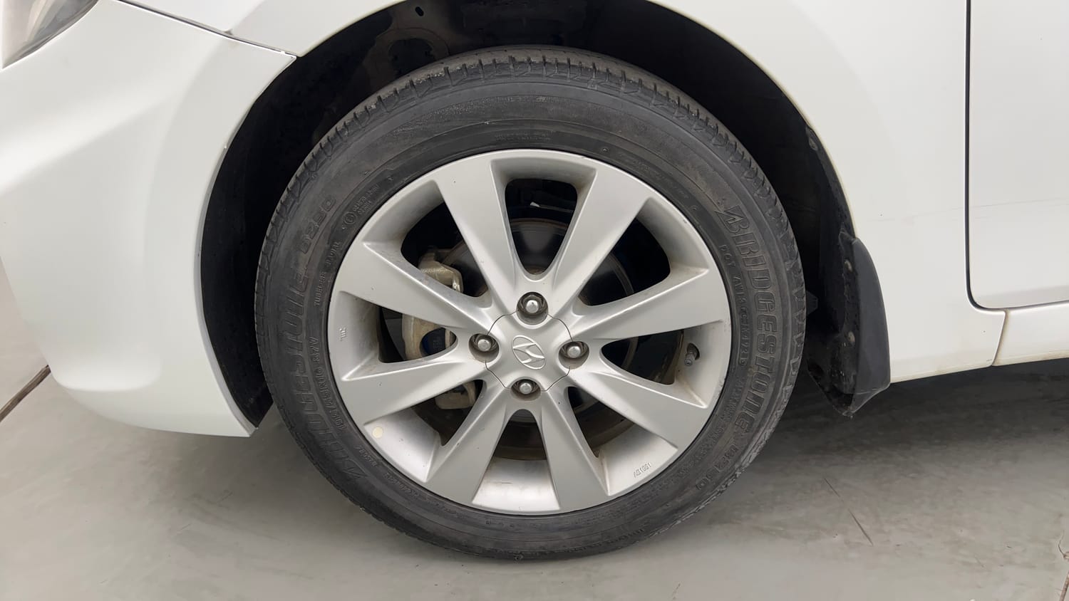 Used 2013 Hyundai Verna Fluidic 1.6 VTVT SX Opt Petrol Manual tyres LEFT FRONT TYRE RIM VIEW